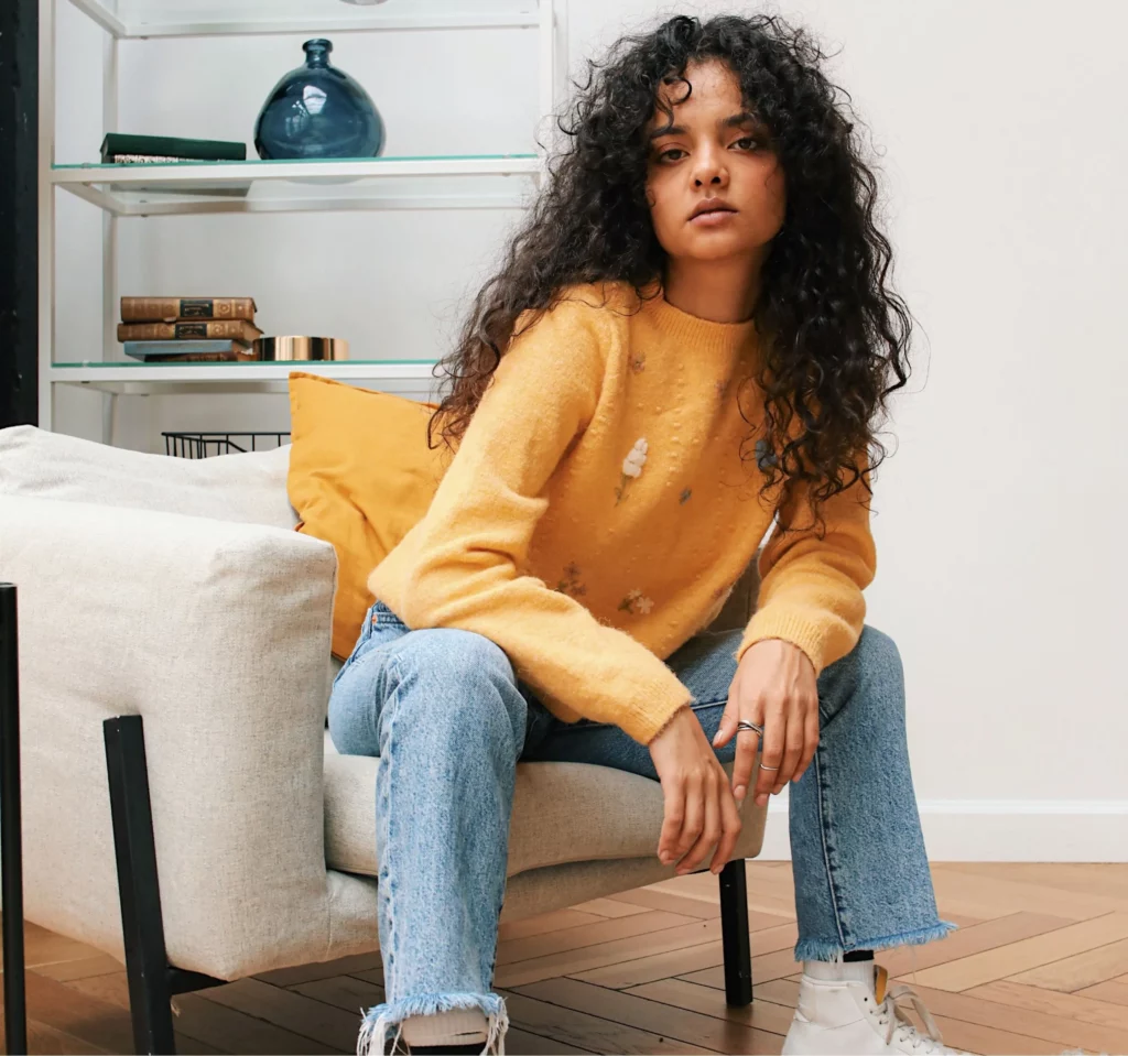 Girl sitting on Sofa